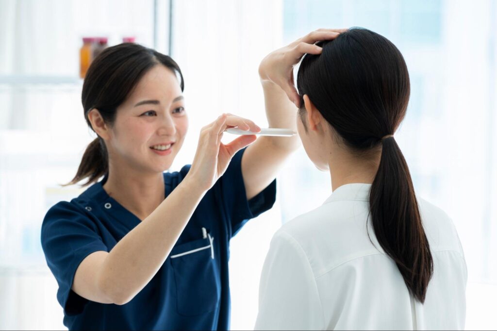 肌育注射を受けている女性